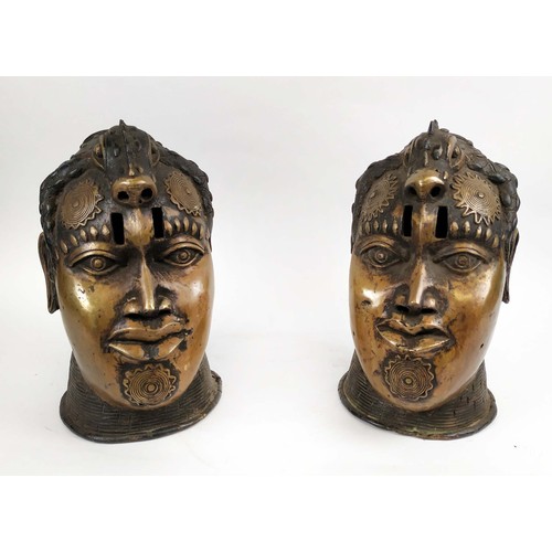 129 - BENIN OBA HEADS, a pair, 33cm H, bronze. (2)