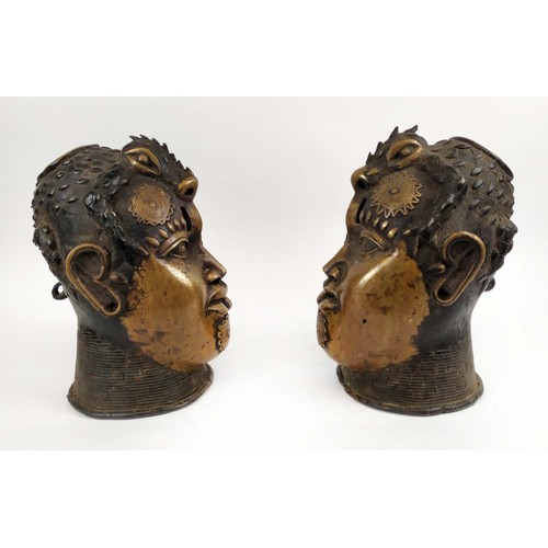 129 - BENIN OBA HEADS, a pair, 33cm H, bronze. (2)