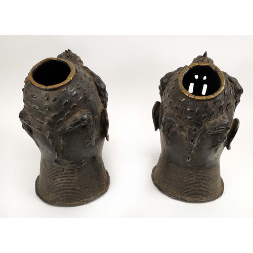 129 - BENIN OBA HEADS, a pair, 33cm H, bronze. (2)