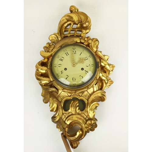 121 - CARTEL WALL CLOCK, early 20th century, Swedish gilt 58cm H.