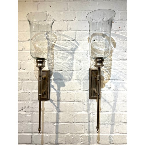 293 - STORM LANTERNS, a pair, Regency design wall mounted, silvered metal with glass shades. 72cm H (2)