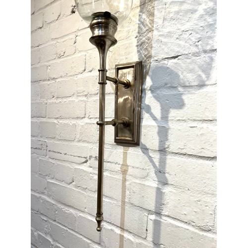 293 - STORM LANTERNS, a pair, Regency design wall mounted, silvered metal with glass shades. 72cm H (2)