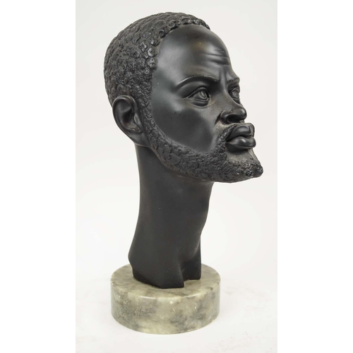 133 - A GIANELLI SCULPTURE, 36cm H, Italian mid century, African man on circular marble base.