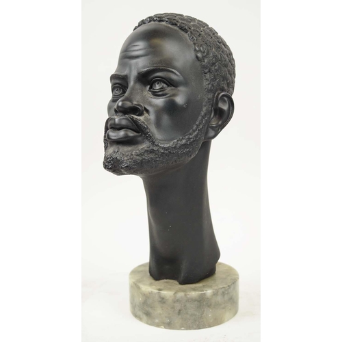 133 - A GIANELLI SCULPTURE, 36cm H, Italian mid century, African man on circular marble base.