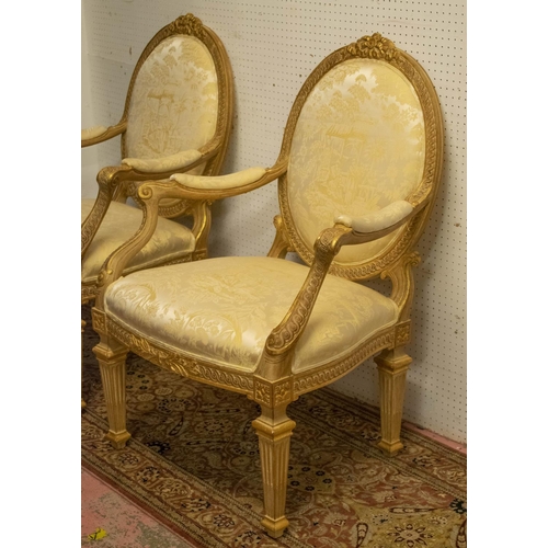 322 - FAUTEUILS,103cm H x 71cm W, a pair, Louis XVI style giltwood in Chinoiserie cream damask and a cream... 