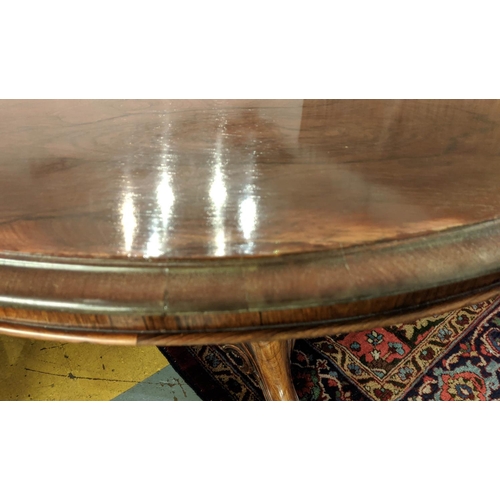 318 - BREAKFAST TABLE, 73cm H x 132cm diam, mid Victorian rosewood with circular tilt top on brass castors... 