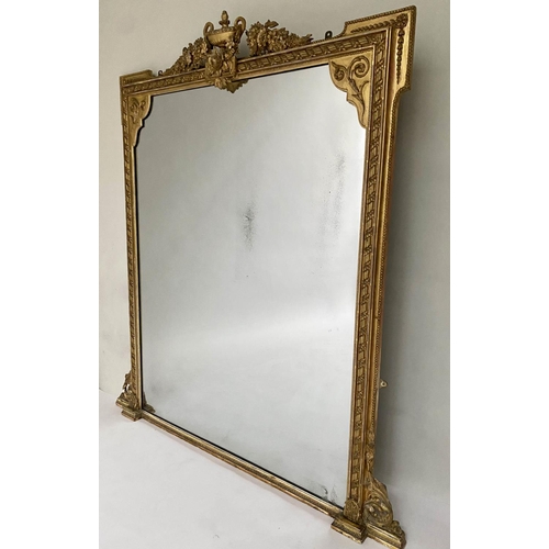 210 - OVERMANTEL MIRROR, 19th century, giltwood and gesso moulded, with urn crest and scroll supports, 135... 