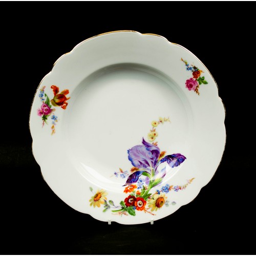 135 - PART DINNER SERVICE, comprising twelve hand painted foliate KPM soup bowls, nine dinner plates, two ... 