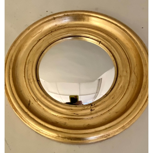 596 - CONVEX BUTLER MIRRORS, a set of three, 40cm diam, gilt frames, Regency style. (3)