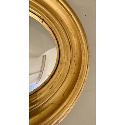 596 - CONVEX BUTLER MIRRORS, a set of three, 40cm diam, gilt frames, Regency style. (3)