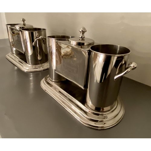 595 - WINE COOLERS, a pair, 23cm H x 35cm W, polished metal, stamped with wine house. (2)