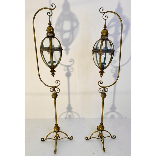 593 - FLOOR STANDING LANTERNS, a pair, 163cm x 35cm, Regency style. (2)