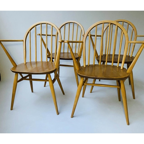 429 - ERCOL WINDSOR DINING CHAIRS, a set of four elm stick hoop back armchairs with solid seats (all label... 