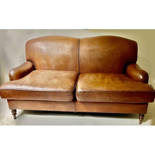 238 - SOFA, Vintage Howard style and ranch manner, leather with turned front supports 165cm W