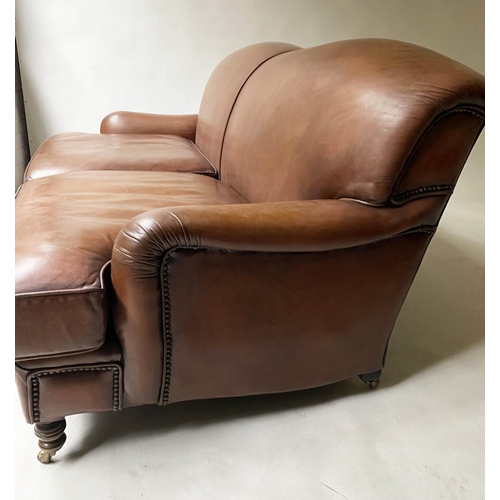 238 - SOFA, Vintage Howard style and ranch manner, leather with turned front supports 165cm W