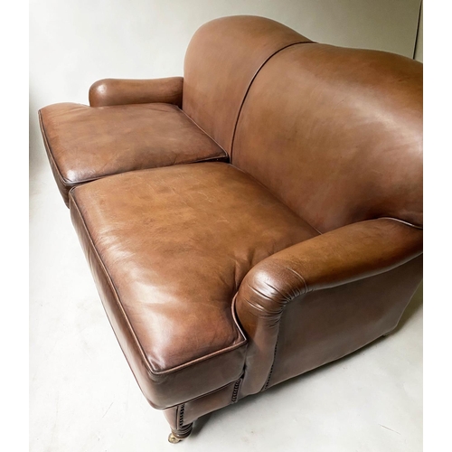 238 - SOFA, Vintage Howard style and ranch manner, leather with turned front supports 165cm W