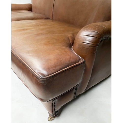 238 - SOFA, Vintage Howard style and ranch manner, leather with turned front supports 165cm W