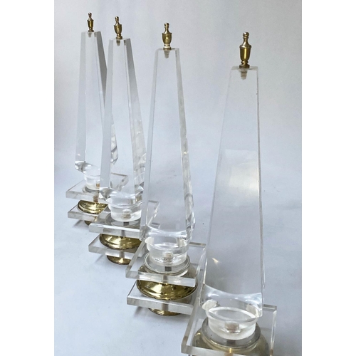 247 - TABLE OBELISKS, a set of four, 42cm H, Lucite, of tapering form on gilded bases. (4)