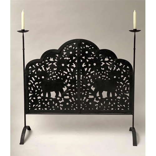 229 - ELEPHANT FENDER, wrought iron with candlestick standards and elephants pierced panel, 97cm x 94cm H.