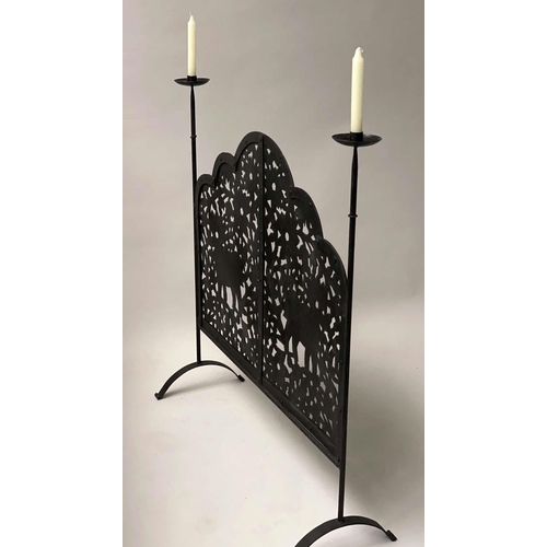229 - ELEPHANT FENDER, wrought iron with candlestick standards and elephants pierced panel, 97cm x 94cm H.