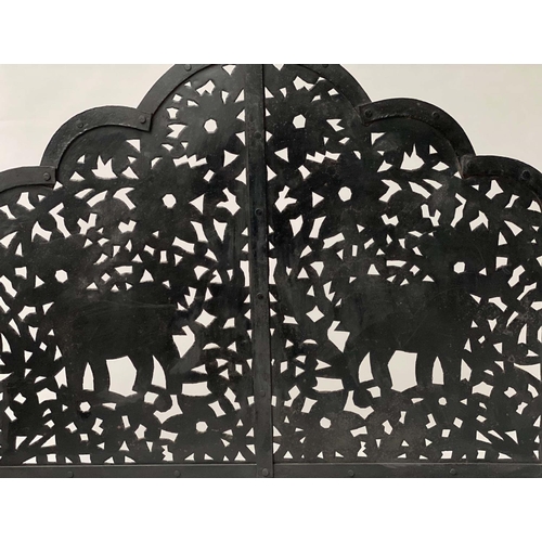 229 - ELEPHANT FENDER, wrought iron with candlestick standards and elephants pierced panel, 97cm x 94cm H.