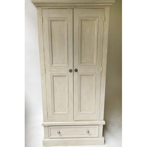 222 - ARMOIRE, French style, grey painted, with two panelled doors enclosing hanging space above a drawer,... 