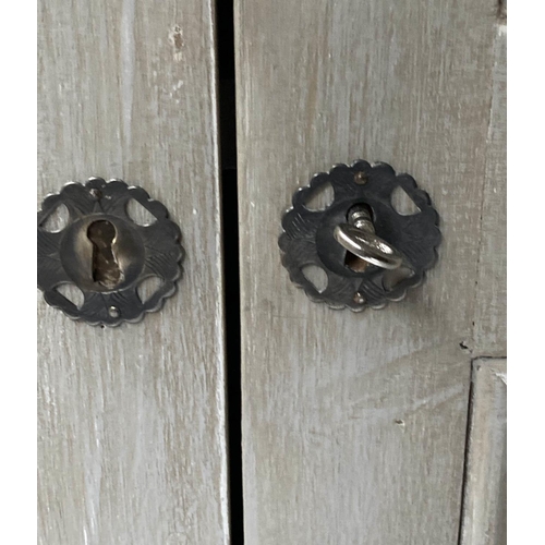 222 - ARMOIRE, French style, grey painted, with two panelled doors enclosing hanging space above a drawer,... 