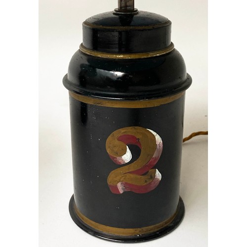 224 - TOLEWARE TABLE LAMPS, a pair, early 20th century gilt lettered toleware tea canisters converted to l... 