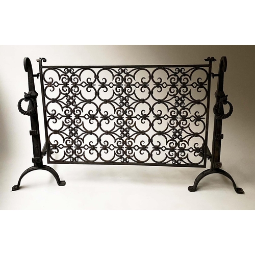 220 - FIREDOGS/FENDER, wrought iron with two fire dog ends and suspended grillwork fender, 141cm x 79cm H.