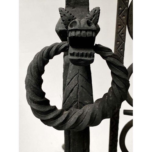220 - FIREDOGS/FENDER, wrought iron with two fire dog ends and suspended grillwork fender, 141cm x 79cm H.
