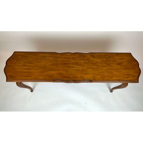 297 - CONSOLE TABLE, French provincial style fruit wood, the shaped top above a carved frieze on cabriole ... 