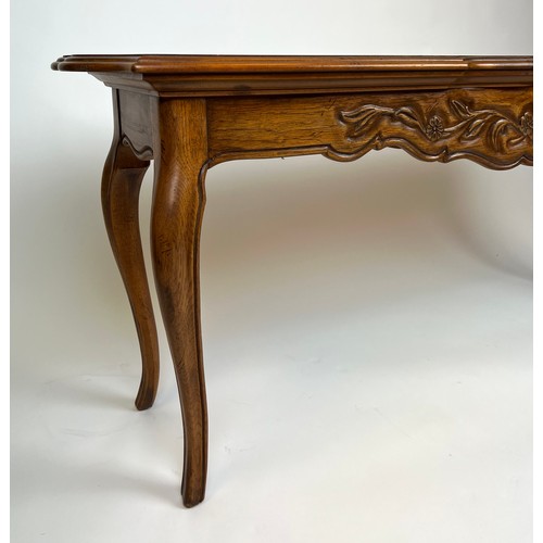 297 - CONSOLE TABLE, French provincial style fruit wood, the shaped top above a carved frieze on cabriole ... 