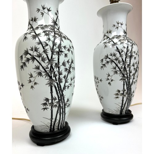 300 - TABLE LAMPS, a pair, Chinese ceramic vase form bamboo decorated, 50cm H. (2)