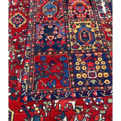 13 - ANTIQUE PERSIAN BAKHTIARI CARPET, 350cm x 220cm.