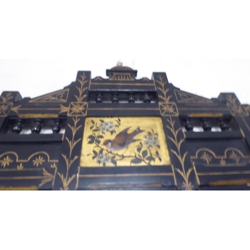 280 - AESTHETIC OVERMANTEL, 121cm W x 131cm H, Victorian ebonised with bird and floral decoration.
