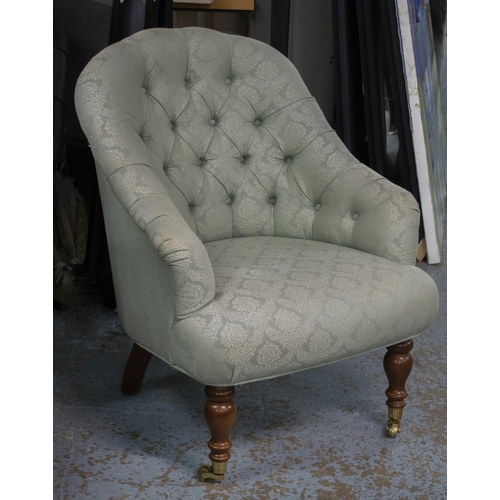 439 - ARMCHAIR, 86cm H x 68cm W, Victorian style in green fabric with brass front castors.