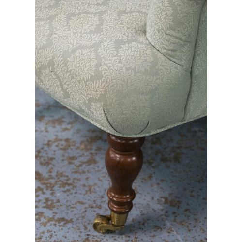 439 - ARMCHAIR, 86cm H x 68cm W, Victorian style in green fabric with brass front castors.