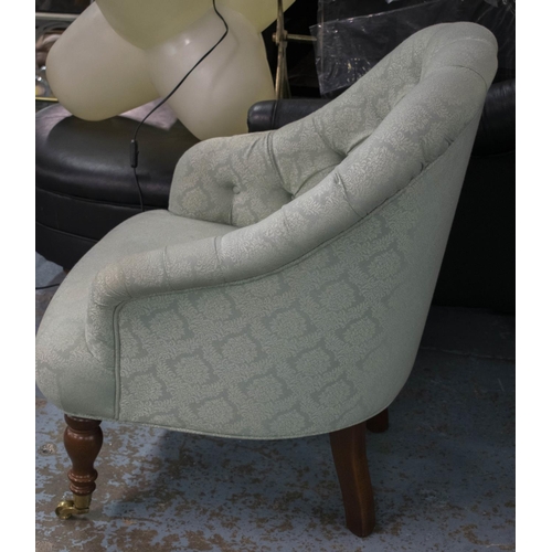 439 - ARMCHAIR, 86cm H x 68cm W, Victorian style in green fabric with brass front castors.
