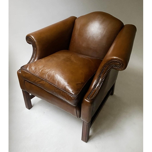 189 - CLUB ARMCHAIR, George III style mahogany, with natural hide leather upholstery and stretchered suppo... 
