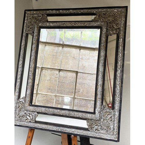 193 - WALL MIRROR, 111cm H x 95cm W, 19th century Dutch, cushion form, repoussé silvered metal, with bevel... 