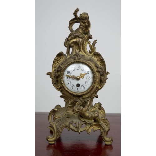 138 - MANTLE CLOCK, 19th century French Rococo, enameled face with scrolling putti adorned bronze case, 30... 