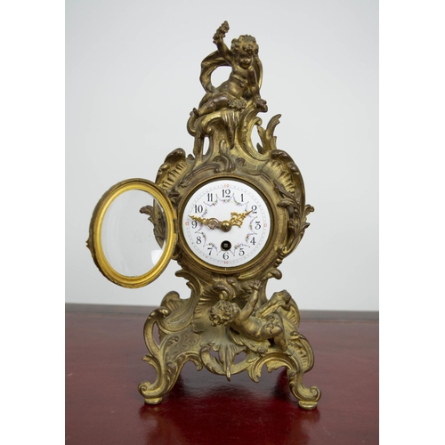 138 - MANTLE CLOCK, 19th century French Rococo, enameled face with scrolling putti adorned bronze case, 30... 