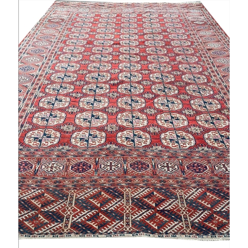 24 - ANTIQUE TURKMAN BOKHARA CARPET, 350cm x 235cm.