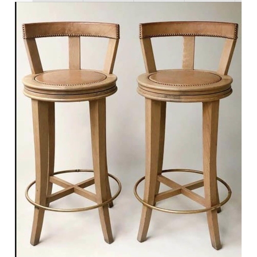 191 - BAR STOOLS, a pair, by Wychwood design Oxfordshire in studded  leather and solid oak, 102cm H seat h... 