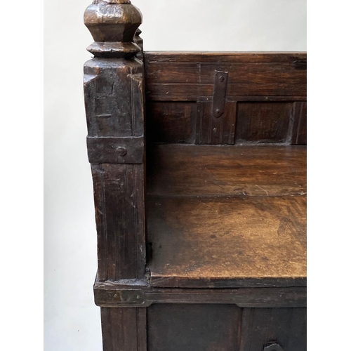 193 - INDIAN SETTLE, North Indian teak and iron bound with rising seat and cushion, 140cm x 75cm x 90cm H.