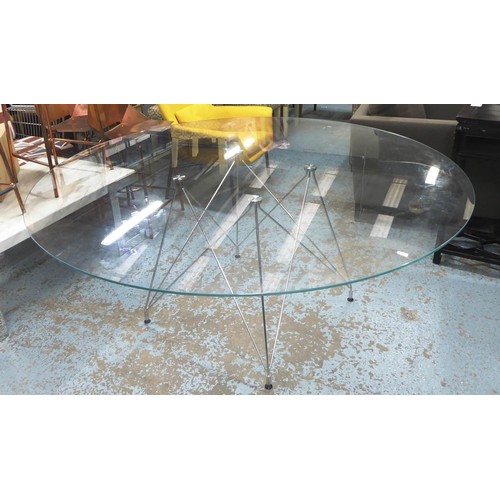 565 - DINING TABLE, 180cm diam x 73cm H with circular glass top on a metal base.