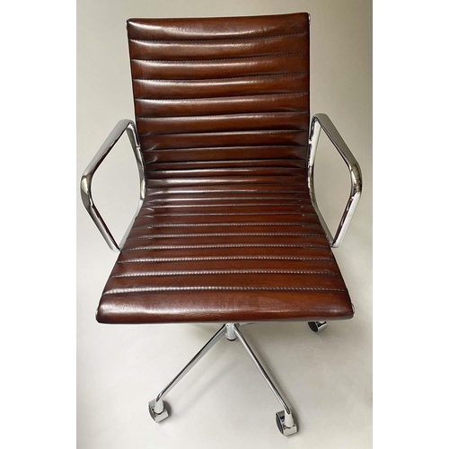 128 - REVOLVING DESK CHAIR, Charles and Ray Eames inspired, with ribbed natural leather seat, rocking and ... 