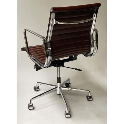 128 - REVOLVING DESK CHAIR, Charles and Ray Eames inspired, with ribbed natural leather seat, rocking and ... 