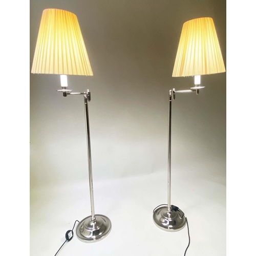 140 - STANDARD/READING LAMPS, a pair, chromium framed with twin hinged adjustable arms and shades, 150cm H... 