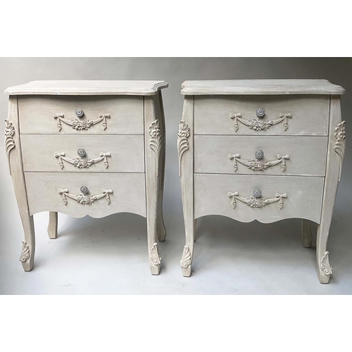 143 - BEDSIDE CHESTS, a pair, French style grey painted bombé each with three drawers, 61cm x 34cm x 76cm ... 